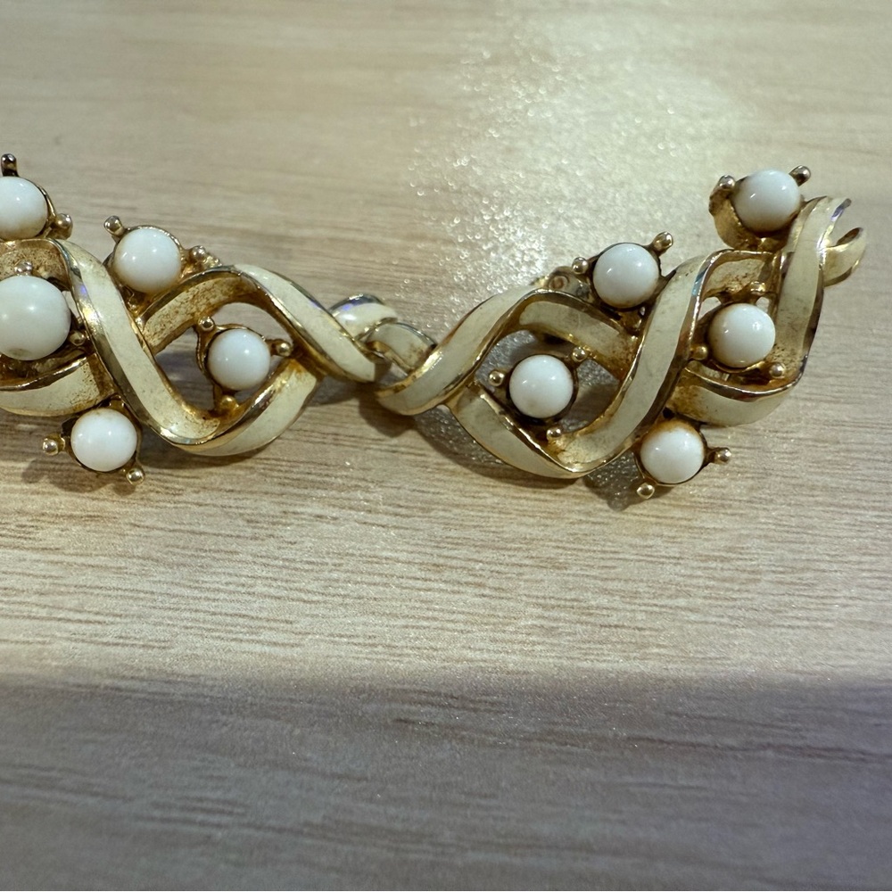 Coro engraved gold plated and white beads clip on vintage earrings